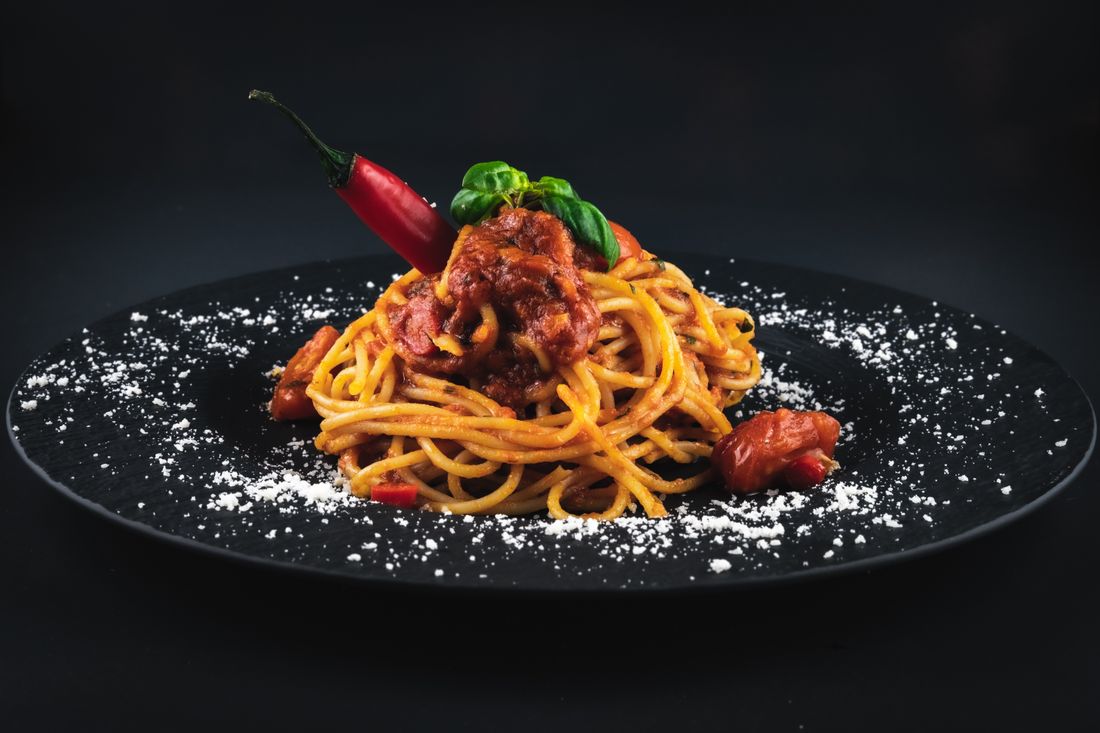 Spaghetti Corte D'Assisi with tomato, peperoncino and parmigiano